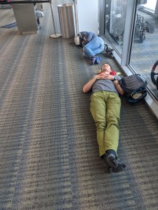 Marypat and Sawyer sleeping off airport frustration